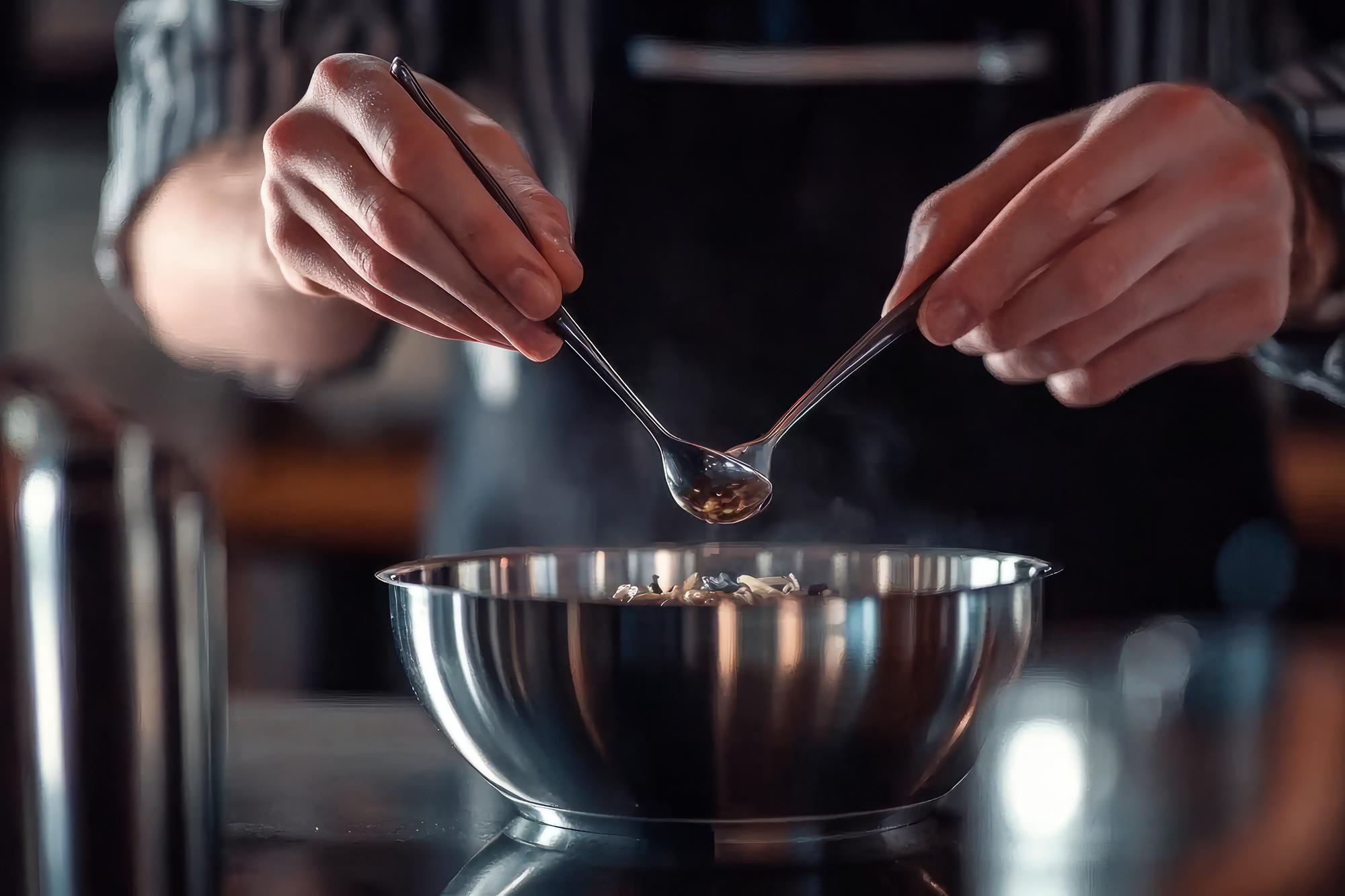 Chef hands mixing ingredients
